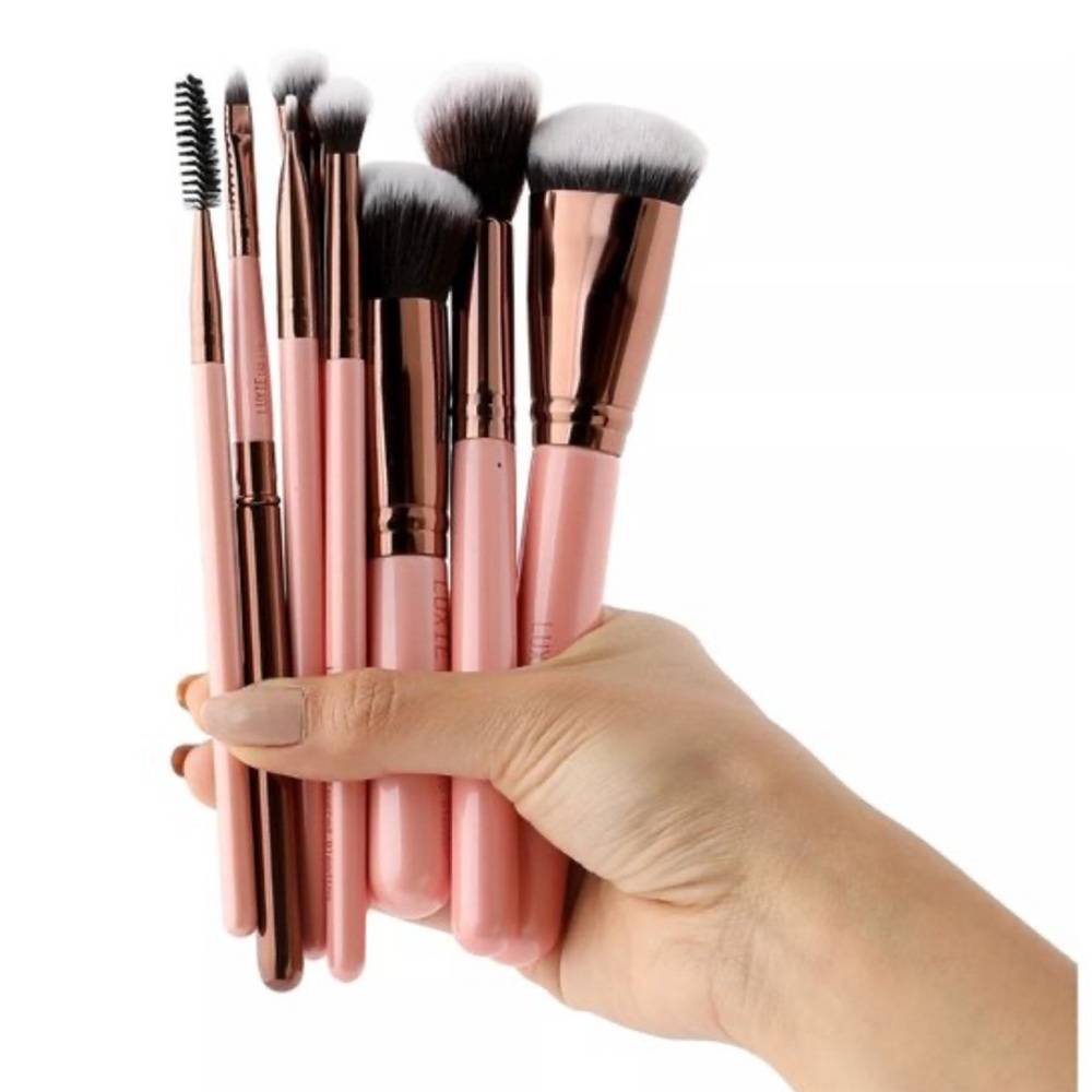 Luxie complete 8 piece set in rose gold . New in original package.